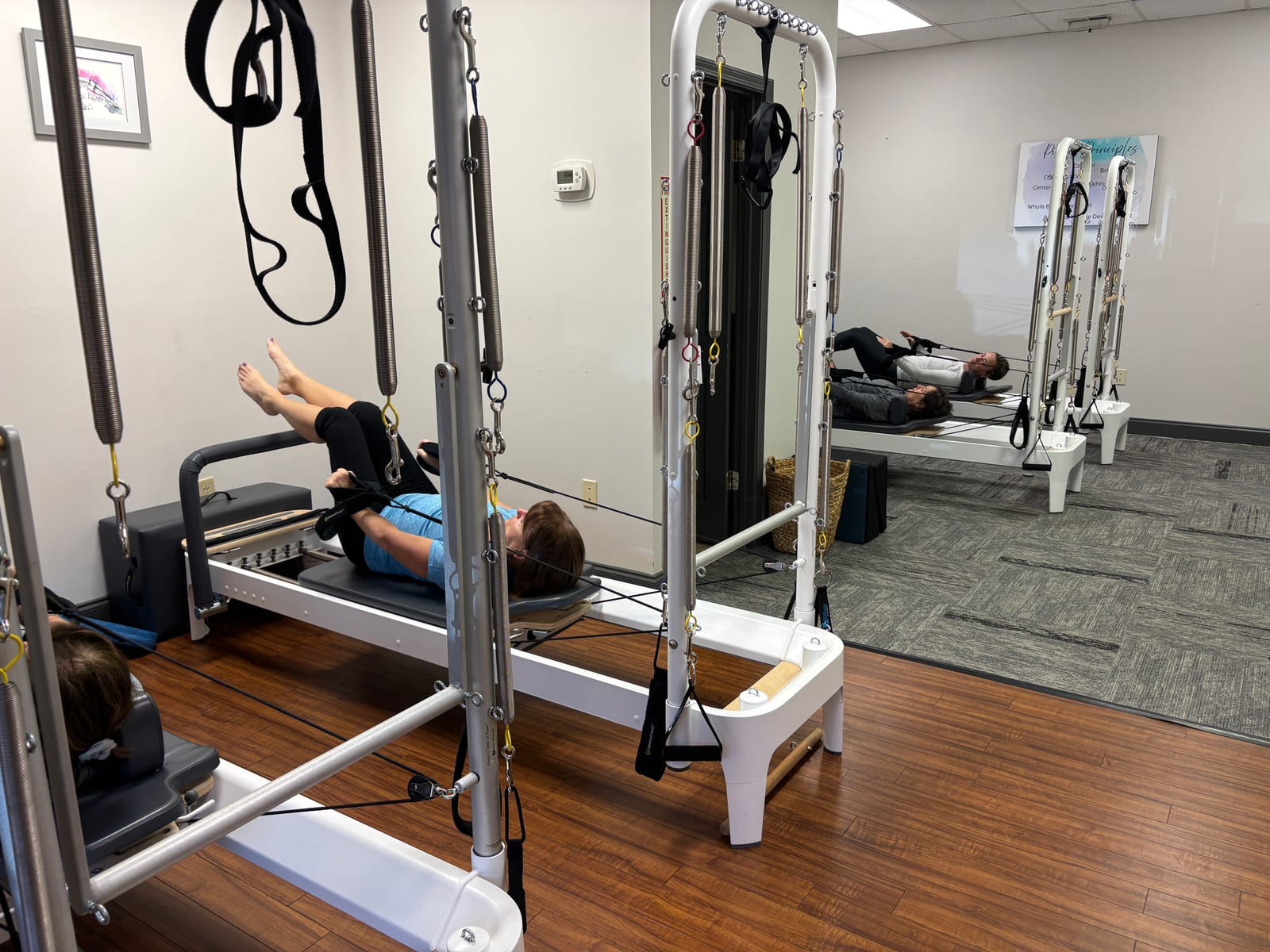 Woman on a Pilates reformer at Parks Pilates in Salem, SC