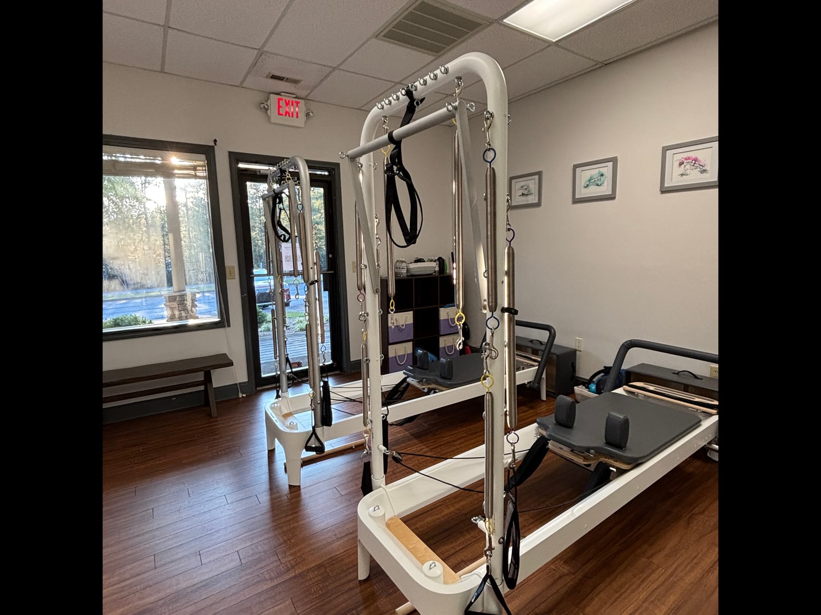 Woman practicing reformer Pilates at Parks Pilates